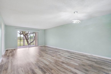 Welcome to this beautiful 2-bedroom, 2-bathroom condominium - photo 1