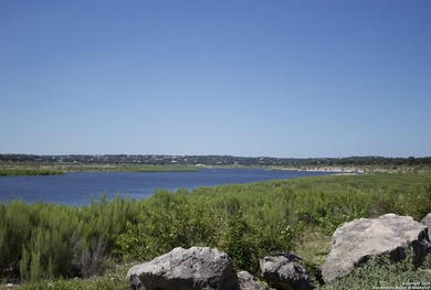 Scenic lot featuring mature oak trees, ideally located just - photo 8