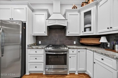 This custom-built home has all the upgrades and additions you - photo 22