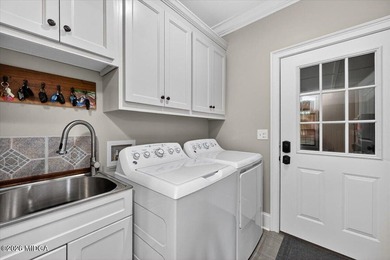 This custom-built home has all the upgrades and additions you - photo 32