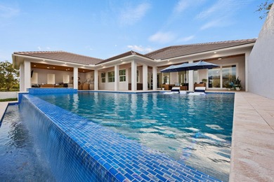 This architectural showpiece of coastal waterfront living - photo 5