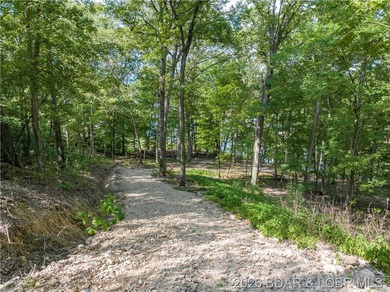 !.6 acres on beautiful Lake of the Ozarks. Gentle sloping lot - photo 18