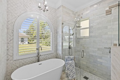 This architectural showpiece of coastal waterfront living - photo 9