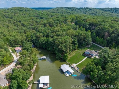 !.6 acres on beautiful Lake of the Ozarks. Gentle sloping lot - photo 32