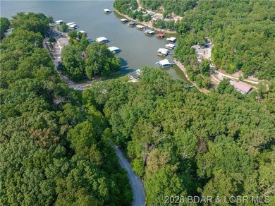 !.6 acres on beautiful Lake of the Ozarks. Gentle sloping lot - photo 35