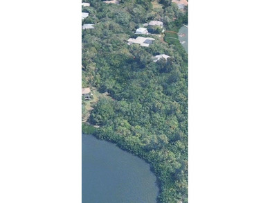 RARE 1.6 ACRES ** WATERFRONT ** LOT. No fixed bridges. Tucked - photo 2