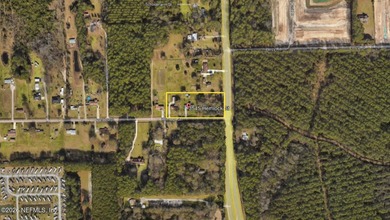 Prime corner parcel in an area of explosive growth! - photo 1