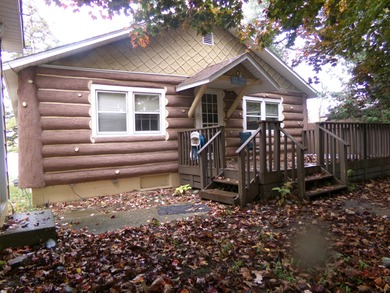 Lake Home For Sale in Atlanta, Michigan