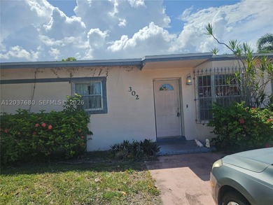 Charming corner-lot home in desirable Delray Beach in an up and - photo 1