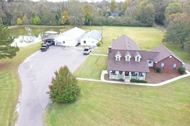 Tucked away in a quiet, private setting, this move-in-ready home - photo 2