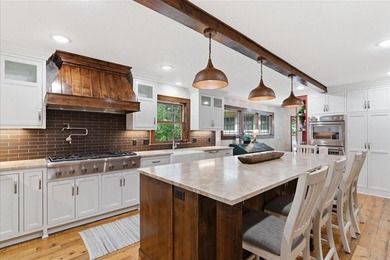 Nestled on the shores of Lake Ossawinnamakee, this stunning - photo 12