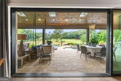 AR Homes built this custom residence around one of Chattahoochee - photo 15