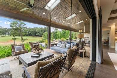 AR Homes built this custom residence around one of Chattahoochee - photo 16