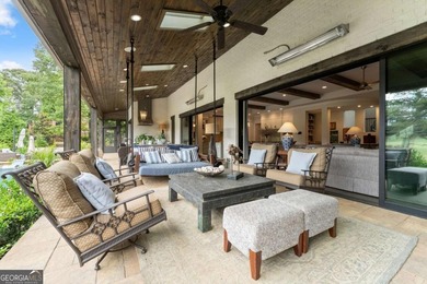 AR Homes built this custom residence around one of Chattahoochee - photo 17