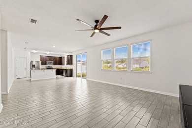 Need help with cash to close? This move-in ready Jacksonville - photo 3