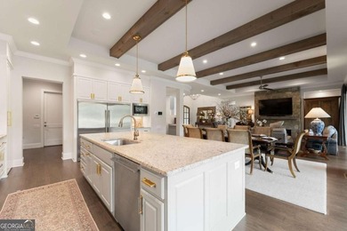 AR Homes built this custom residence around one of Chattahoochee - photo 24