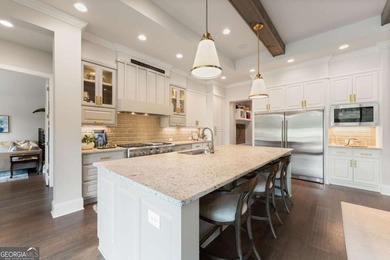 AR Homes built this custom residence around one of Chattahoochee - photo 25