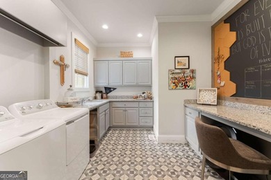 AR Homes built this custom residence around one of Chattahoochee - photo 27