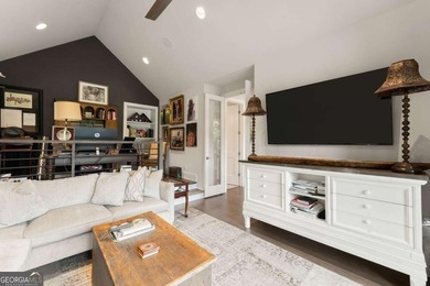 AR Homes built this custom residence around one of Chattahoochee - photo 28