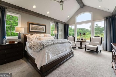 AR Homes built this custom residence around one of Chattahoochee - photo 32
