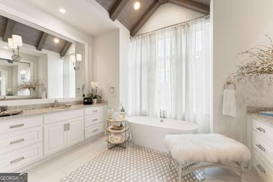AR Homes built this custom residence around one of Chattahoochee - photo 34