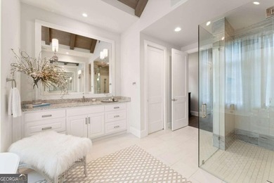 AR Homes built this custom residence around one of Chattahoochee - photo 36