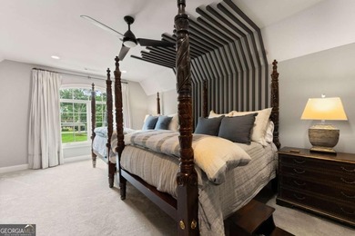 AR Homes built this custom residence around one of Chattahoochee - photo 45