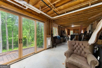 AR Homes built this custom residence around one of Chattahoochee - photo 47