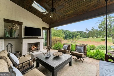 AR Homes built this custom residence around one of Chattahoochee - photo 48