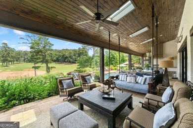 AR Homes built this custom residence around one of Chattahoochee - photo 49