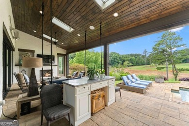 AR Homes built this custom residence around one of Chattahoochee - photo 50
