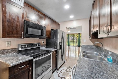Step into comfort with this charming first-floor 2 bedroom, 2 - photo 2