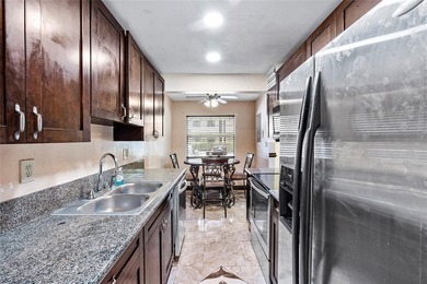 Step into comfort with this charming first-floor 2 bedroom, 2 - photo 3
