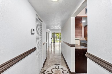 Step into comfort with this charming first-floor 2 bedroom, 2 - photo 4