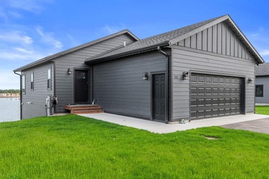 Enjoy turnkey living at Sand Point Lake with this newly built - photo 29