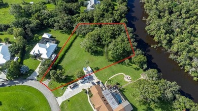 BEAUTIFUL > 1 ACRE WATERFRONT PROPERTY IN QUIET NEIGHBORHOOD - photo 1