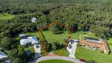 BEAUTIFUL > 1 ACRE WATERFRONT PROPERTY IN QUIET NEIGHBORHOOD - photo 9