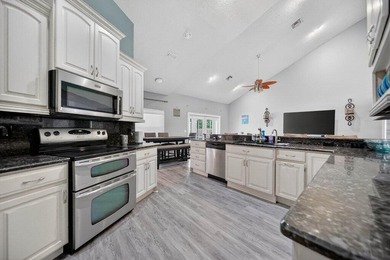 Welcome to this well-appointed 4-bedroom, 3-bathroom residence - photo 9