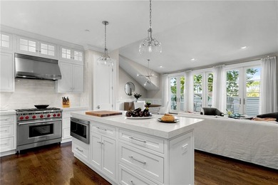 Sophisticated Penthouse unit with soaring ceilings, oversized