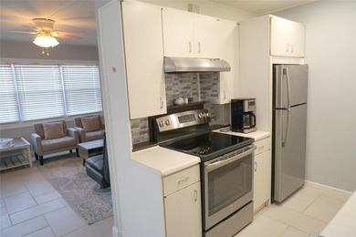 This Penthouse 1 bedrum, 1.5 bath w/ beautiful water view is - photo 9