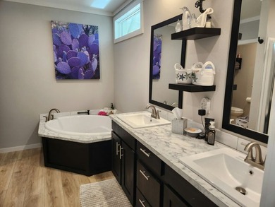 Beautifully maintained 2024 Clayton home offering a spacious - photo 12
