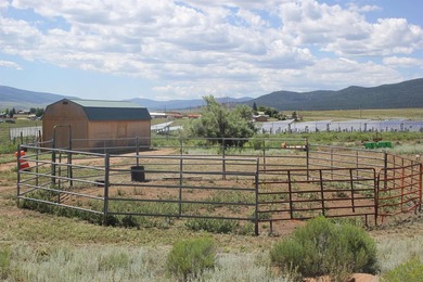 87 acres of pure bliss overlooking Eagle Nest Lake and - photo 12