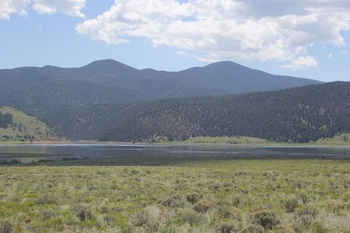 87 acres of pure bliss overlooking Eagle Nest Lake and - photo 25