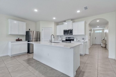 Built in 2023, this meticulously maintained 4/2 CBS home offers - photo 5