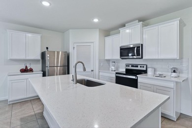 Built in 2023, this meticulously maintained 4/2 CBS home offers - photo 6