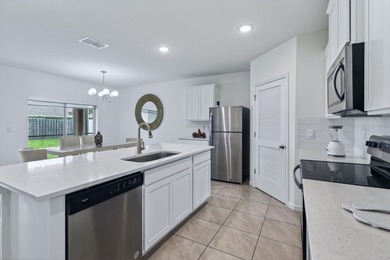 Built in 2023, this meticulously maintained 4/2 CBS home offers - photo 8
