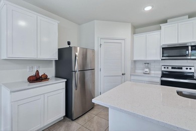 Built in 2023, this meticulously maintained 4/2 CBS home offers - photo 9