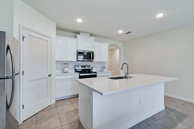 Built in 2023, this meticulously maintained 4/2 CBS home offers - photo 10