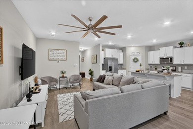 Some homes you tour. This one you settle into. The open layout - photo 11
