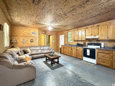 SECLUDED! Tucked away on 1.75 wooded acres, this cute 3-bedroom - photo 3